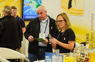 People at SC Exhibitor Booth